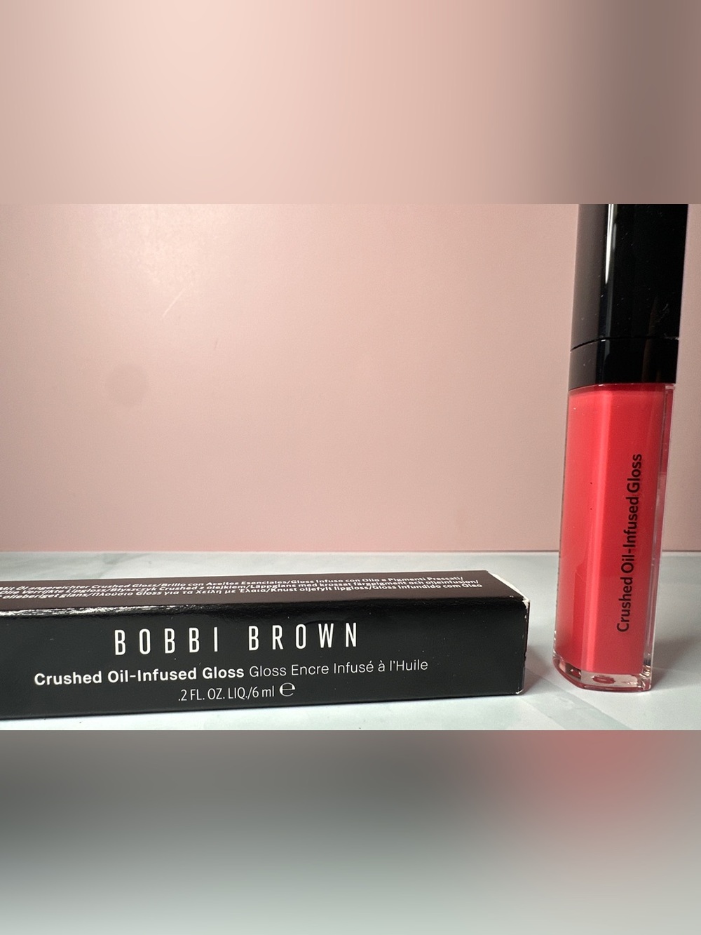 Bobbi Brown Gloss in Black Box with Pink Backdrop